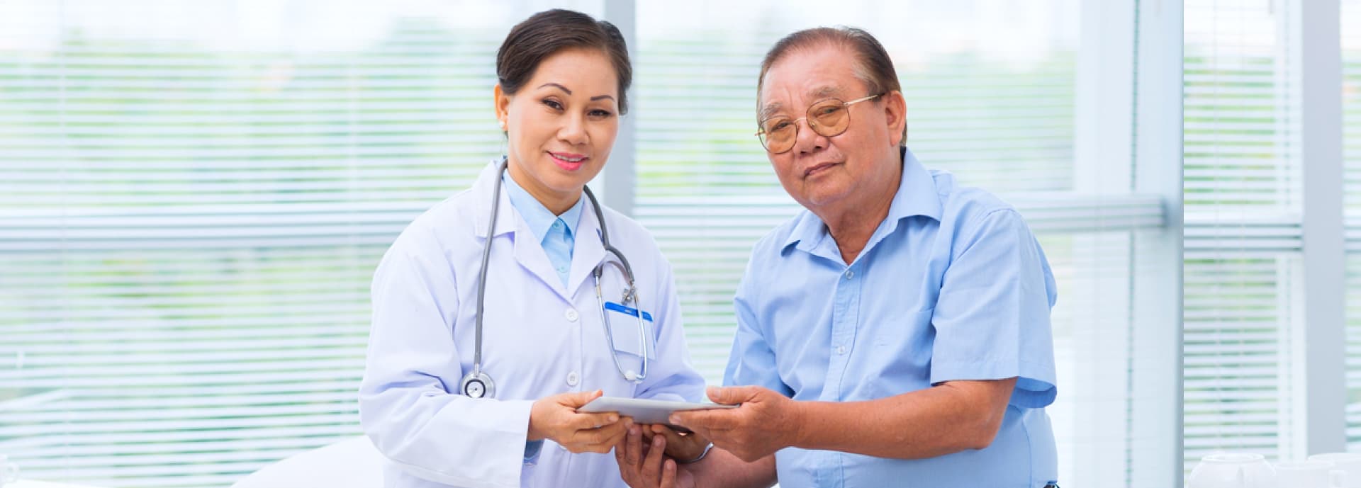 senior man accompanied by his caregiver