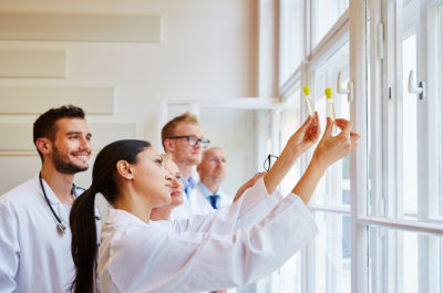 group of physicians checking the urine